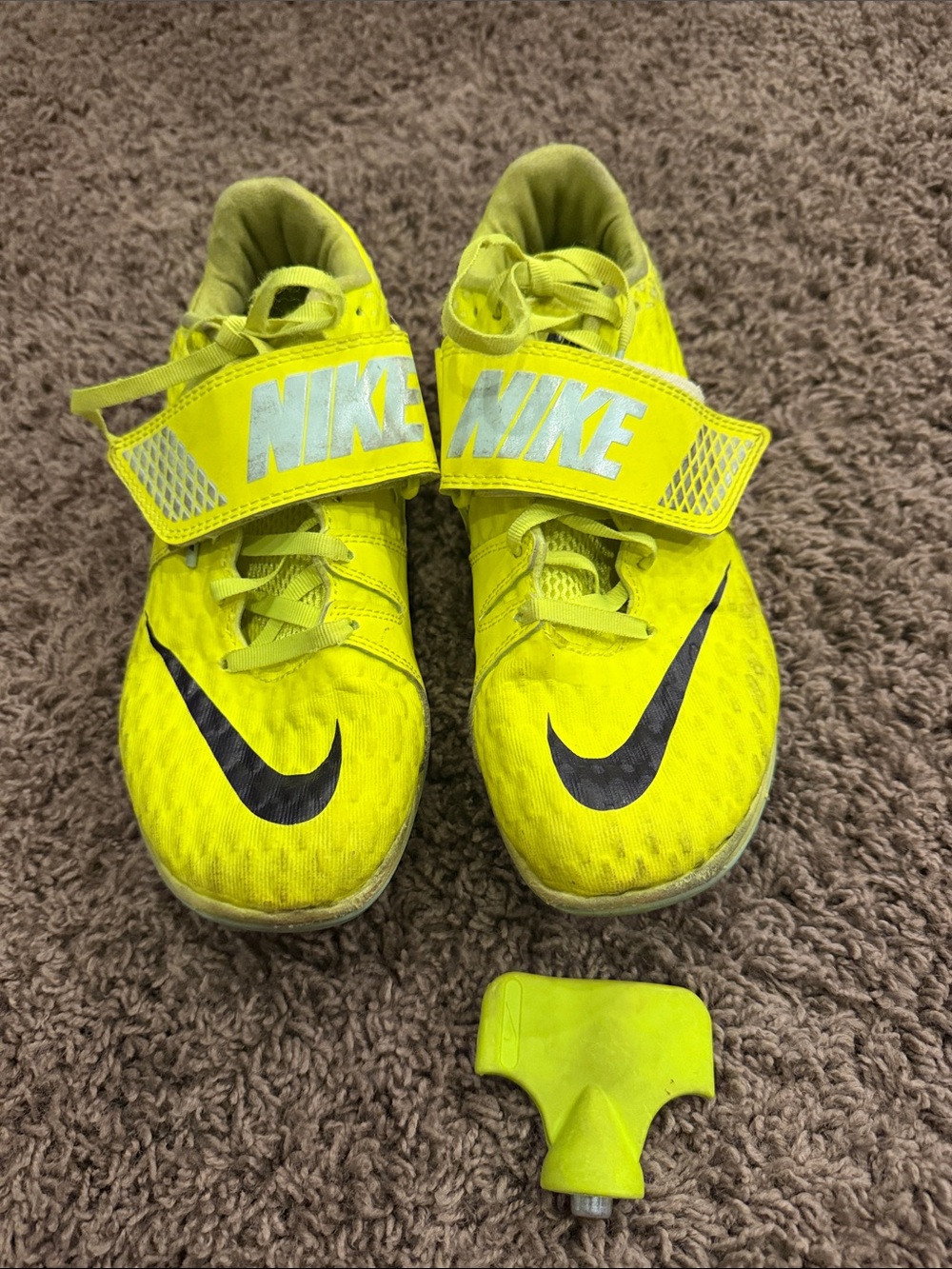 Nike Kids Neon Yellow Athletic Cleats with Black Swoosh